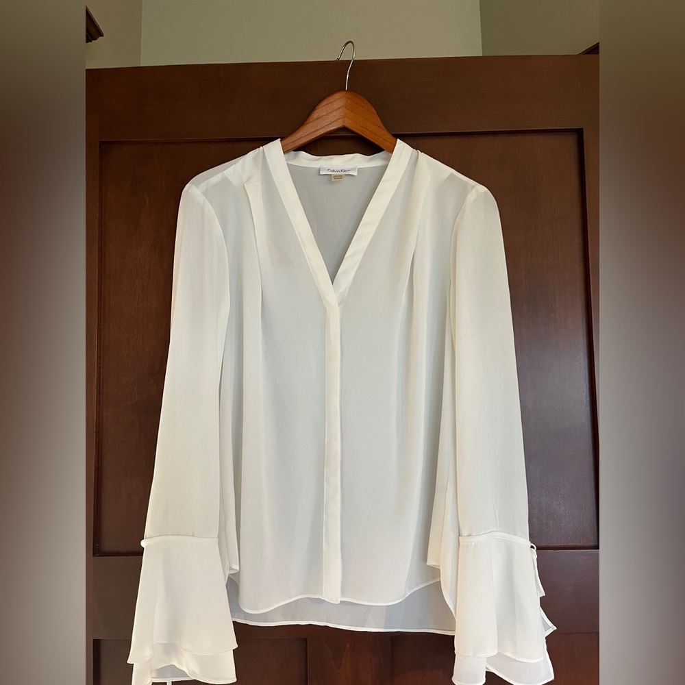 Calvin Klein Chiffon Blouse in Cream White with Bell Sleeve and V neck. …